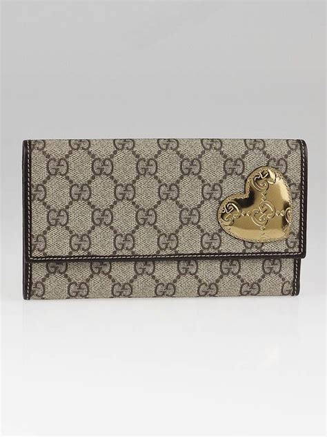 skull wallet gucci|GG Emblem mini wallet in beige and dark brown canvas.